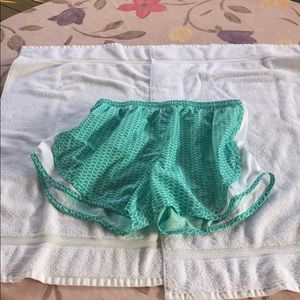 Nike dry fit shorts. Green. Size MED. mild wear.